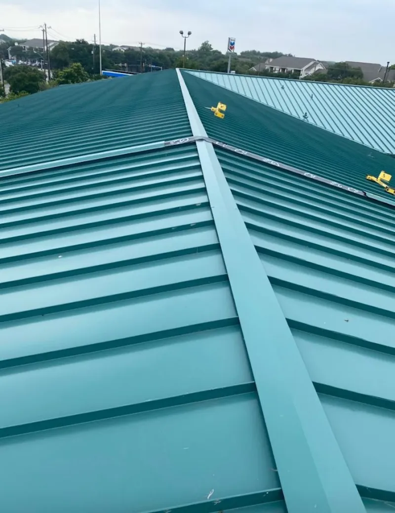 Green commercial metal roof ridge and valley for Metal Roof Repair in Park Hills