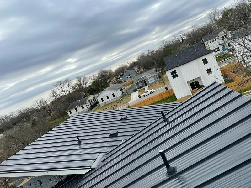 Standing seam metal roof panels with vents for Skylight Repair in Park Hills